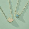 Kendra Scott Bunny Short Pendant Necklace, Fashion Jewelry for Women(GOLD-MATTE LIGHT BLUE DICHROIC GLASS)